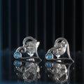 Aqua Kokoro stud earrings in sterling silver with heart shape and natural aquamarine detail