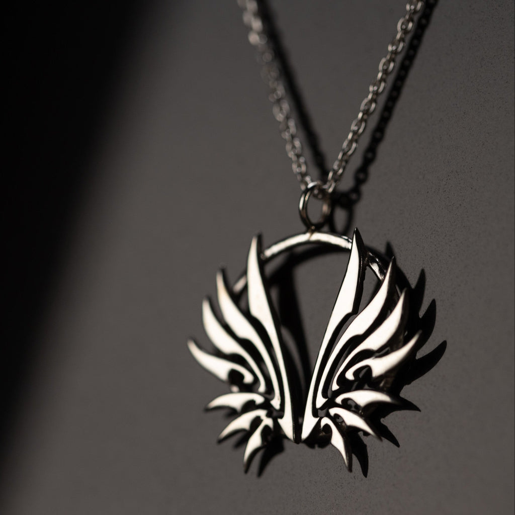 Detail of sterling silver wings pendant