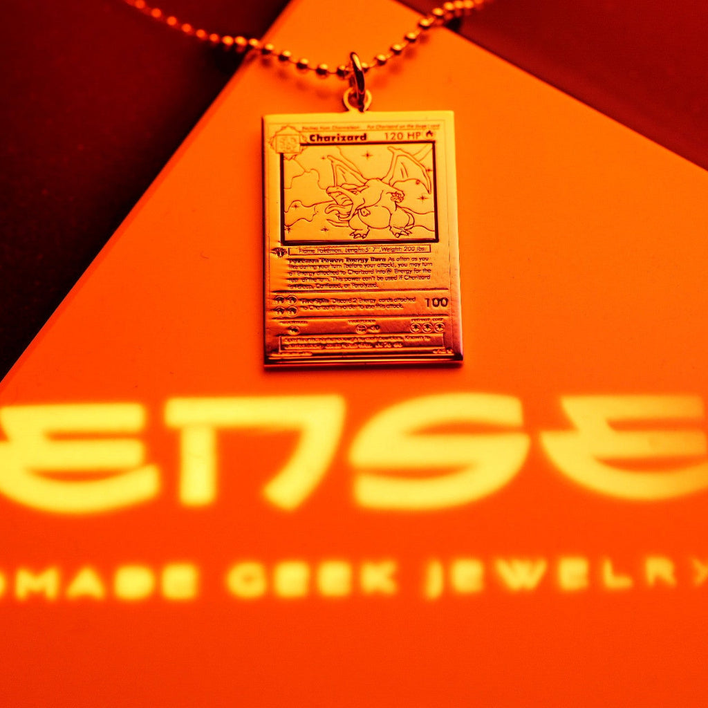 Sterling silver ball chain necklace with flame emblem pendant