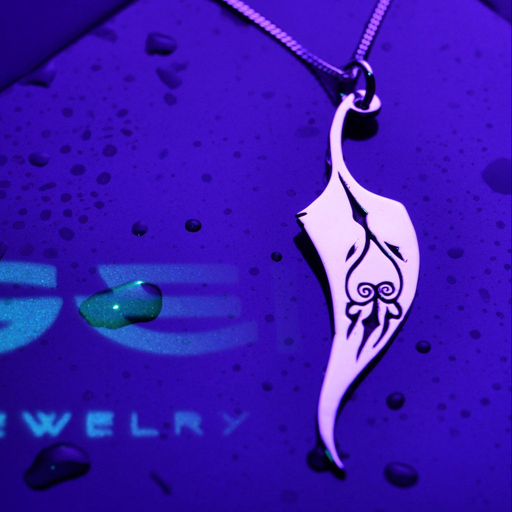 Feather necklace worn – sterling silver pendant
