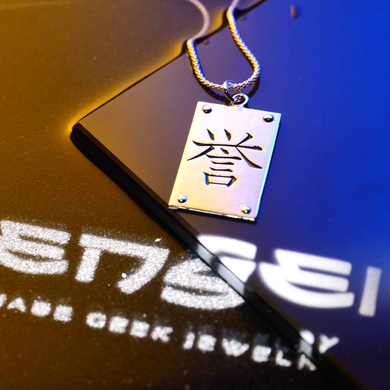 Detail of engraved kanji symbol in sterling silver