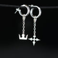 Korona Earrings de cadena en plata de ley con símbolos de corona y cruz unidos por una cadena delicada