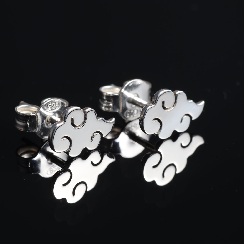 Kumo earrings worn, showing subtle and minimal cloud design