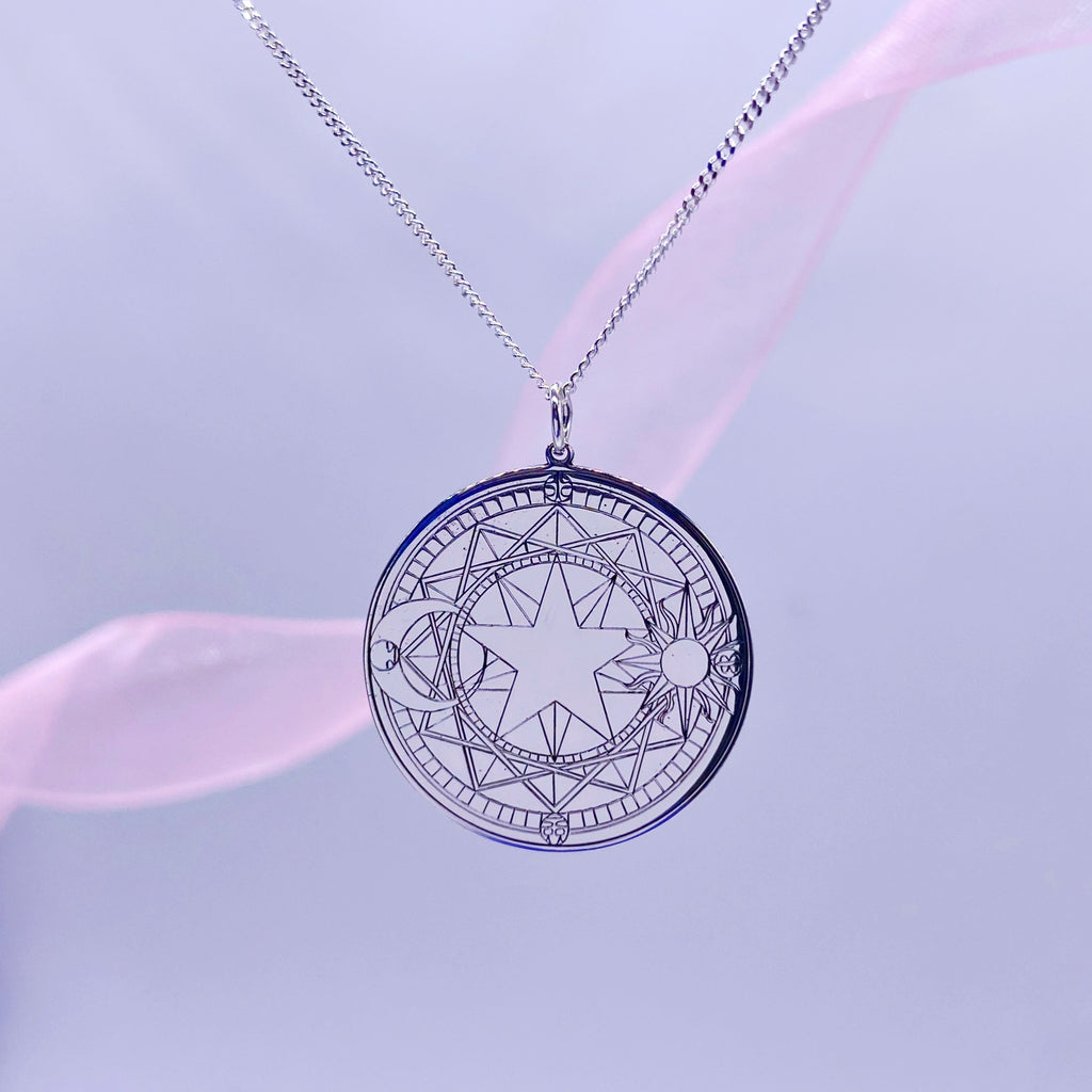 Detail of engraved magical circle in sterling silver