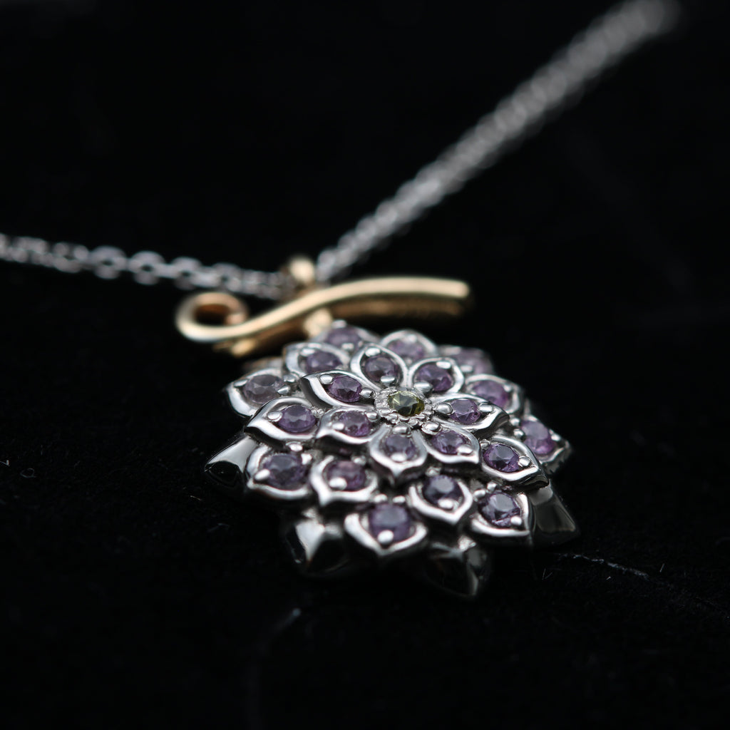 Detail of lilac and yellow sapphires in flower necklace