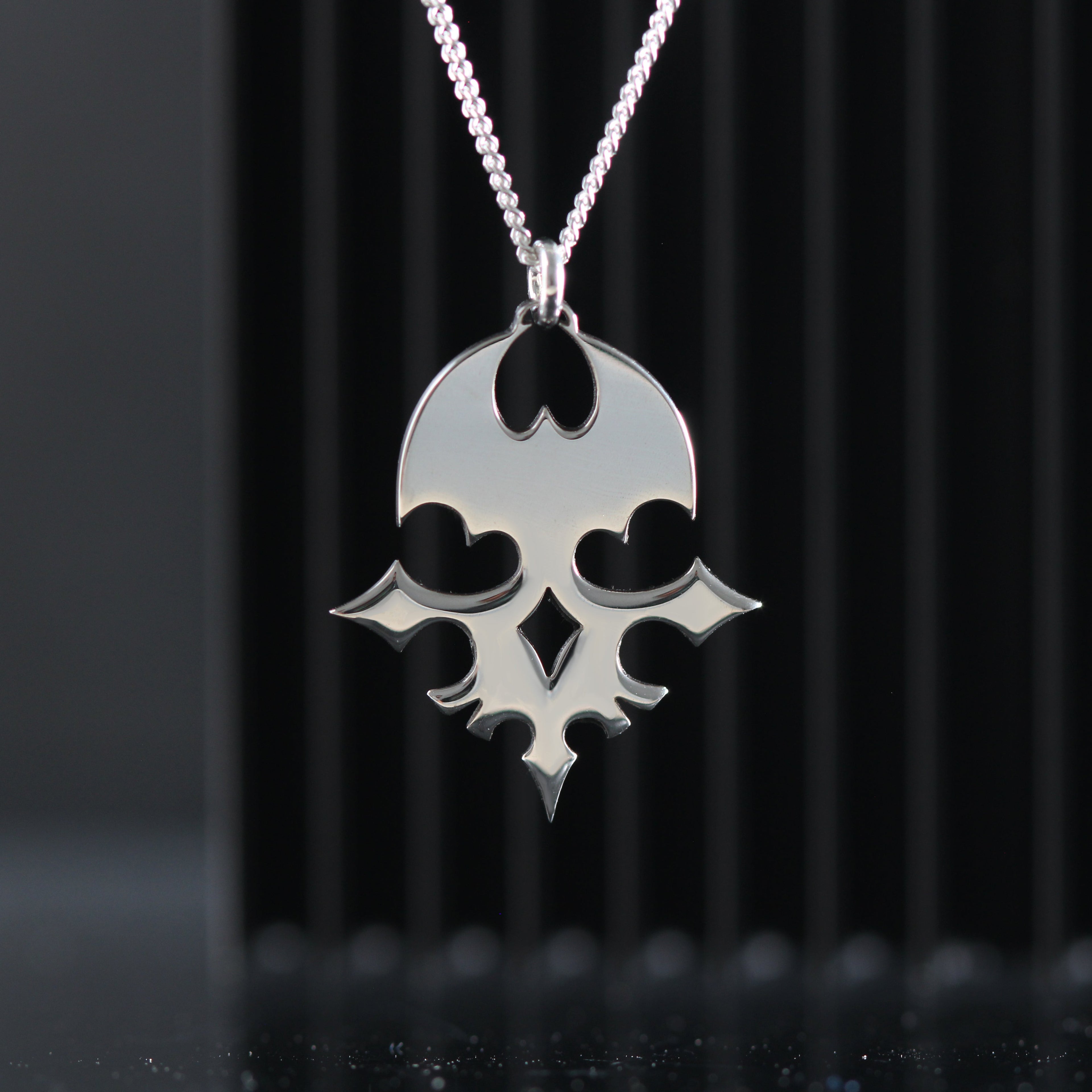 Colgante de emblema de jugador en plata de ley